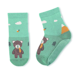 Mintgrüne Sterntaler Babysocken mit Bär Ben Motiv, Wolken, Bäumen und ABS-Noppen.