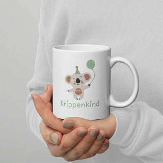 Weiße, glänzende Tasse - Krippenkind